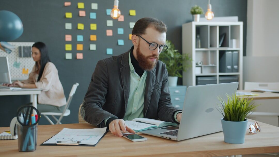 Modern office interior with plants and desks