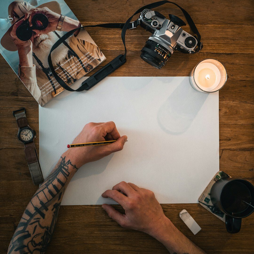 Editor reviewing photographs on a light table